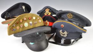 Eight various military hats including Royal Air Force, Welsh Guards, Royal Engineers, German and