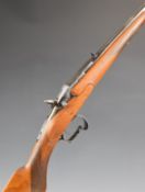 Belgian 9mm Flobert hammer action garden gun with chequered semi-pistol grip and forend, scrolling