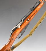 Deactivated Russian Mosin Nagant 7.62 bolt-action rifle with adjustable sights, canvas sling, top