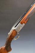 Browning B2G 12 bore over and under ejector shotgun with with scenes of birds and scrolling and