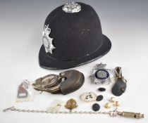 Metropolitan Police helmet by Compton Webb together with associated ephemera including handcuffs,