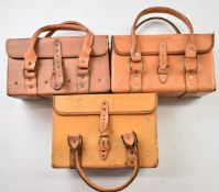 Three leather bound metal lined shotgun cartridge bags, each approximately 35 x 20 x 16cm.