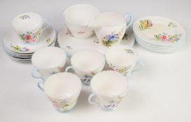 Shelley tea ware decorated in the Wild Flowers pattern, no 13668, twenty one pieces