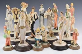 A collection of Capodimonte figurines and figures of children, mostly Vittorio Tessario, tallest