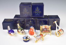 Royal Crown Derby Imari paperweights and miniatures including three birds, bench, garden roller