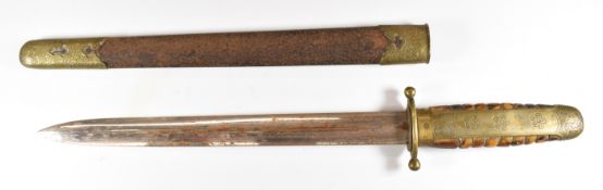 Japanese Meiji period dagger with tortoiseshell grip, brass mounts, 25cm double edged blade and