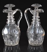Pair of Regency cut clear glass ewers and stoppers, 28cm tall.