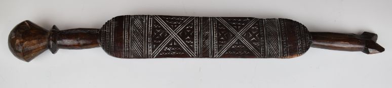 Tuareg carved wood tent post with geometric decoration, length 69cm