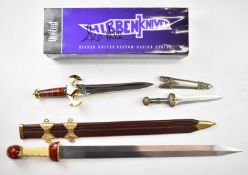 Three replica dagger / swords including a Hibben example, longest blade 72cm. PLEASE NOTE ALL BLADED