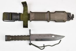 American M9 Lancay knife bayonet with 18cm single edged blade, scabbard and belt attachment.