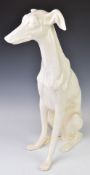 Large ceramic seated greyhound dog figure, height 50cm
