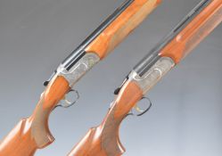 A composed pair of Classic Doubles Sporting 12 bore over and under ejector shotguns each with