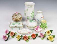 A collection of Herend porcelain including flowers, vases, covered pots etc, patterns include