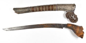 Sumatra dagger with wooden handle and 20cm blade, with carved and decorated sheath. PLEASE NOTE