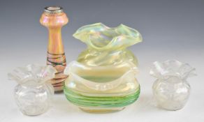 Five pieces of Loetz, Kralik and similar iridescent glassware including two with trailed decoration,