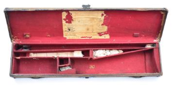 Leather and canvas bound shotgun carry case with remnant of original label, 76 x 18 x 8cm.