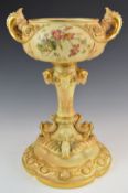 Royal Worcester blush ivory large centrepiece with figural fish handles, relief moulded ram's head