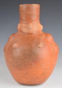 South American figural pottery vase / flask, height 26cm