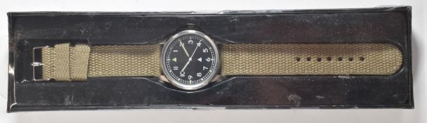 Military style watch with grey webbing strap