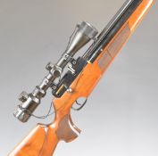 FX Login Solo .22 PCP air rifle with chequered semi-pistol grip and forend, raised cheek piece, 10