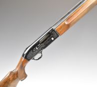 Beretta A301 12 bore three-shot semi-automatic shotgun with engraved locks, chequered semi-pistol