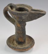 Terracotta pottery oil lamp of some antiquity with traces of original glaze, possibly slipware,