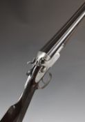 W Jeffery & Co of London 12 bore side by side hammer action shotgun with chequered grip and