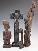Four African carved tribal items including tree of life figure, finely carved headrest etc,