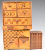 Two miniature Japanese parquetry chests of drawers, the largest W20 x D13 x H15cm, and a puzzle box