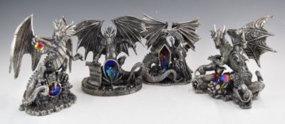 Four Tudor Mint Myth and Magic figures comprising The Messenger, The Dragons Watch, The Pride and