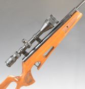 Theoben .22 break-barrel air rifle with chequered semi-pistol grip, skeleton stock, raised cheek-