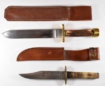 Two hunting knives, one with stag horn handle and 20.5cm blade, the other with 15cm blade, both with
