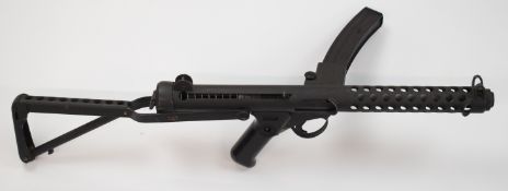 Deactivated Sterling 9mm Sub Machine Gun Mk.IV (SMG) with magazine housing stamped 'Sterling SMG 9mm
