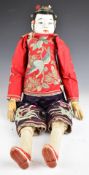 Large Chinese articulated doll with human hair queue / cue, embroidered jacket and bound feet,