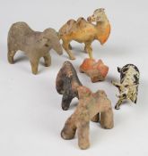 A collection of antique pottery animals including Chinese examples, tallest 10cm