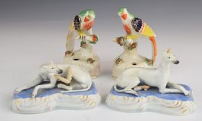 Pair of Staffordshire parrot pen holders and two figures of greyhounds, tallest 13cm