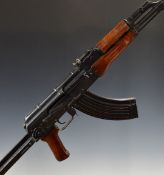 Deactivated AK47 7.62x54mm assault carbine rifle with wooden pistol grip, folding stock,