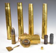 Four brass shell cases, together with a trench art style miniature coal scuttle, two rubber bullets,