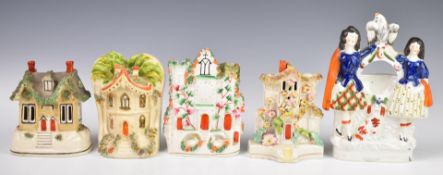 Staffordshire 19thC pastille burners, flatbacks and a figural pocket watch holder, tallest 20.5cm