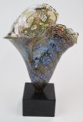 Peter Layton iridescent glass vase mounted on a polished marble base, signed 'Peter Layton 1985'