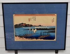Japanese woodblock of sailing ships at anchor and under sail