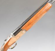 Rizzini 12 bore over and under ejector shotgun with engraved scenes of birds to the sidelock
