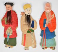 Three Chinese silk on card figures of elders