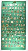 Approximately 100 British metal and anodised cap badges including Cheshire Regiment, Royal Norfolk