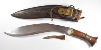 Kukri knife with wooden handle, 31cm blade and leather covered sheath . PLEASE NOTE ALL BLADED ITEMS