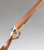 English 12 bore side by side hammer action shotgun with engraved scenes of dogs and birds to the