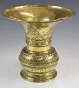 Eastern 19th / 20thC flared brass vase with engraved decoration, diameter 22 x height 21cm