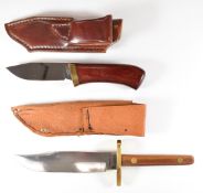 Two hunting / skinning knives, one by True Forged with 16cm Bowie blade and sheath, the other marked