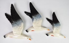 Beswick set of three seagull wall plaques, models 921, 922 and 923, largest 35cm