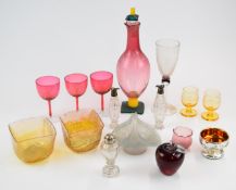 Fifteen pieces of clear and coloured decorative glassware including cranberry decanter with floral